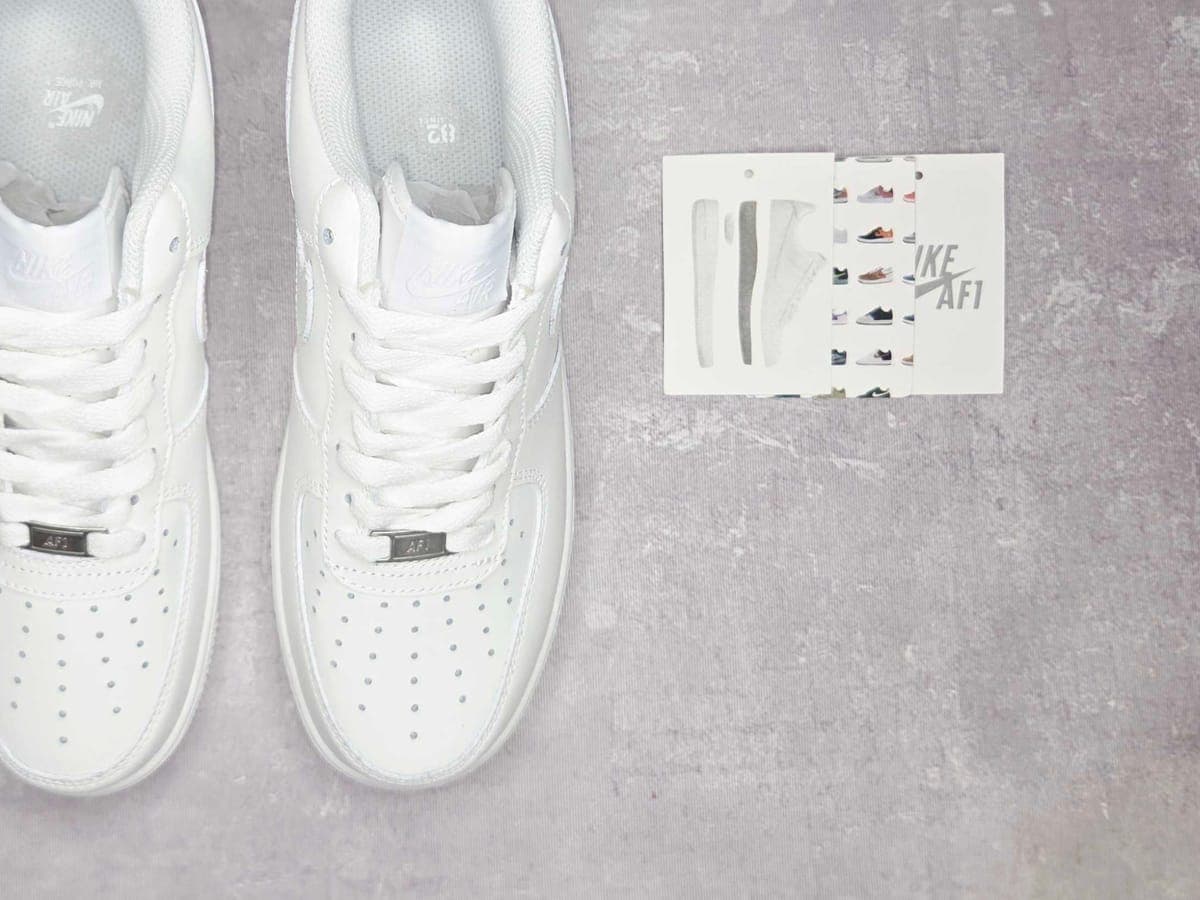 Top-down view of a freshly cleaned Nike Air Force 1 07, white leather restored after a wipe-down routine